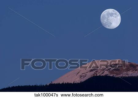 Full Moon at Alpenglow. View Large Photo Image Stock Photograph - Full Moon at Alpenglow.. Fotosearch