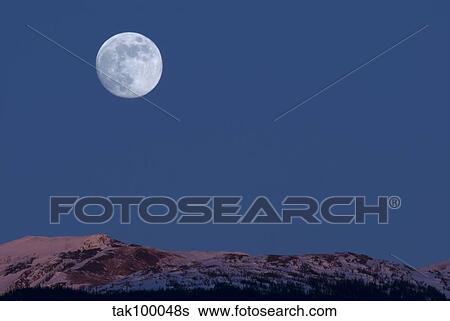Full Moon at Alpenglow. View Large Photo Image Stock Photograph - Full Moon at Alpenglow.. Fotosearch