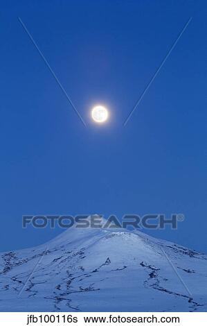 Full moon over Ogilvie Mountains, Canada. View Large Photo Image Stock Photograph - Full moon over Ogilvie Mountains, Canada.. Fotosearch