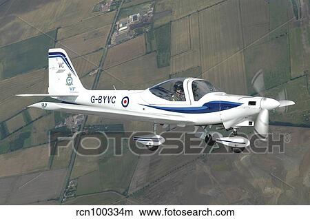 G-115 Tutor basic trainer in-flight over England. View Large Photo Image Picture - G-115 Tutor basic trainer in-flight over England.. Fotosearch