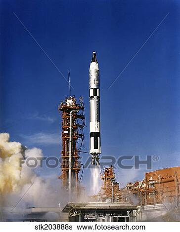 Gemini 12 astronauts lift off aboard a Titan launch vehicle. View Large Photo Image Stock Photograph - Gemini 12 astronauts lift off aboard a Titan launch vehicle.. Fotosearch