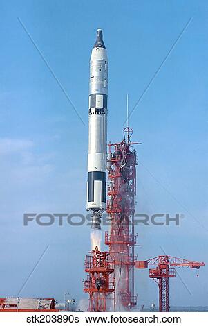Gemini VI lifts off from its launch pad at Cape Canaveral, Florida. View Large Photo Image Stock Photograph - Gemini VI lifts off from its launch pad at Cape Canaveral, Florida.. Fotosearch