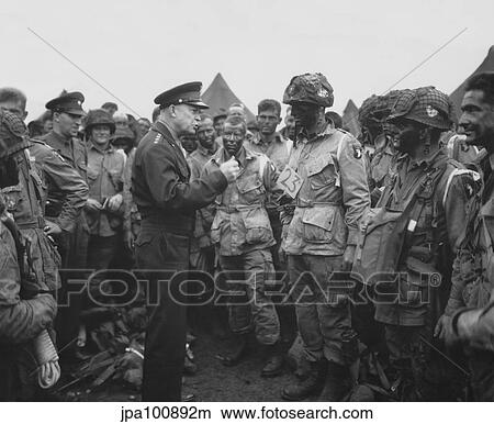 General Dwight D. Eisenhower talking with soldiers of the 101st Airborne Division. View Large Photo Image Picture - General Dwight D. Eisenhower talking with soldiers of the 101st Airborne Division.. Fotosearch