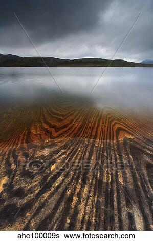 Geology lines in Sandvannet Lake, Nordland County, Norway. View Large Photo Image Stock Photograph - Geology lines in Sandvannet Lake, Nordland County, Norway.. Fotosearch