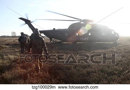 German soldiers boarding a German CH-53GS helicopter. View Large Photo Image Picture - German soldiers boarding a German CH-53GS helicopter.. Fotosearch