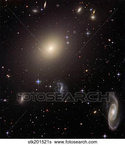 Giant Elliptical Galaxy and its Host Galaxy Cluster. View Large Photo Image Stock Photograph - Giant Elliptical Galaxy and its Host Galaxy Cluster.. Fotosearch