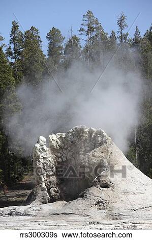 Giant Geyser steaming geyserite cone, Yellowstone National Park, Wyoming. View Large Photo Image Stock Photograph - Giant Geyser steaming geyserite cone, Yellowstone National Park, Wyoming.. Fotosearch