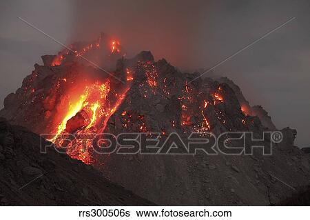 Glowing Rerombola lava dome of Paluweh volcano, Indonesia. View Large Photo Image Stock Photograph - Glowing Rerombola lava dome of Paluweh volcano, Indonesia.. Fotosearch
