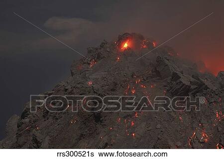 Glowing summit of Rerombola lava dome of Paluweh volcano. View Large Photo Image Stock Photograph - Glowing summit of Rerombola lava dome of Paluweh volcano.. Fotosearch