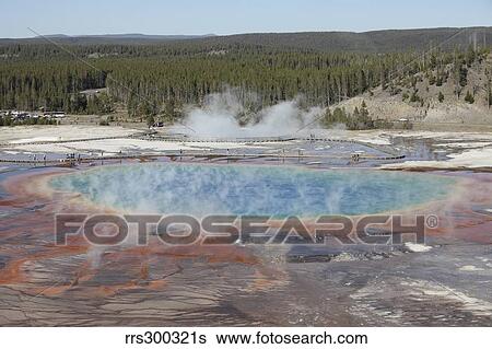 Stock Photograph - Grand Prismatic Spring, Midway Geyser Basin geothermal area, Yellowstone National Park, Wyoming.. Fotosearch