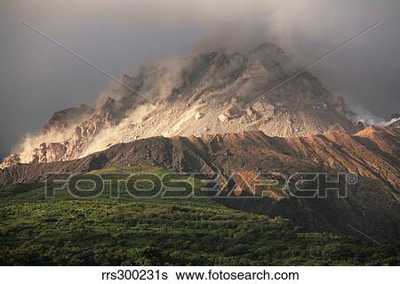Stock Photograph - Growing lava dome of Soufriere Hills volcano, Montserrat, Caribbean.. Fotosearch