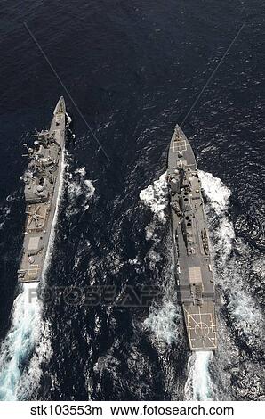 Guided-missile destroyer USS Gridley, left, passes the guided-missile cruiser USS Chancellorsville. View Large Photo Image Picture - Guided-missile destroyer USS Gridley, left, passes the guided-missile cruiser USS Chancellorsville.. Fotosearch