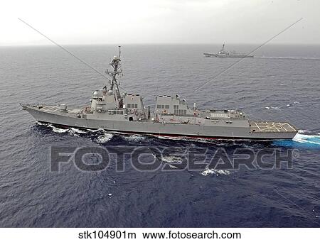 Guided missile destroyers USS Dewey and USS Pinckney transit the South China Sea. View Large Photo Image Picture - Guided missile destroyers USS Dewey and USS Pinckney transit the South China Sea.. Fotosearch