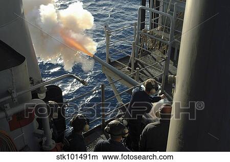 Gunner's Mates fire the. 40mm saluting battery aboard USS Bataan. View Large Photo Image Picture - Gunner's Mates fire the. 40mm saluting battery aboard USS Bataan.. Fotosearch