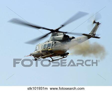 H-1 Upgrades Test Pilot, launches a pair of 2. 75 inch rockets from UH-1Y. View Large Photo Image Picture - H-1 Upgrades Test Pilot, launches a pair of 2. 75 inch rockets from UH-1Y.. Fotosearch
