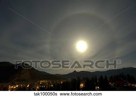 Harvest Moon Halo, Lumby, British Columbia, Canada. View Large Photo Image Stock Photograph - Harvest Moon Halo, Lumby, British Columbia, Canada.. Fotosearch