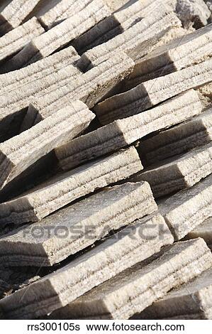 Harvested slabs of largely halite salt, salt lake, Danakil Depression, Ethiopia. View Large Photo Image Stock Photograph - Harvested slabs of largely halite salt, salt lake, Danakil Depression, Ethiopia.. Fotosearch