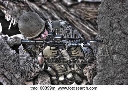 HDR image of a German Army soldier armed with a M4 carbine. View Large Photo Image Picture - HDR image of a German Army soldier armed with a M4 carbine.. Fotosearch