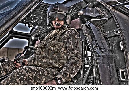 HDR image of a pilot sitting in the cockpit of a UH-60 Black Hawk. View Large Photo Image Picture - HDR image of a pilot sitting in the cockpit of a UH-60 Black Hawk.. Fotosearch