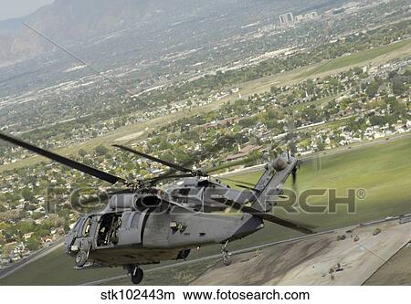 HH-60 Pave Hawks in flight over Utah. View Large Photo Image Picture - HH-60 Pave Hawks in flight over Utah.. Fotosearch
