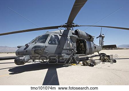 HH-60G Pave Hawk with pararescuemen equipment. View Large Photo Image Picture - HH-60G Pave Hawk with pararescuemen equipment.. Fotosearch