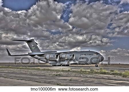 High dynamic range image of a C-17 Globemaster as it was unloading. View Large Photo Image Picture - High dynamic range image of a C-17 Globemaster as it was unloading.. Fotosearch