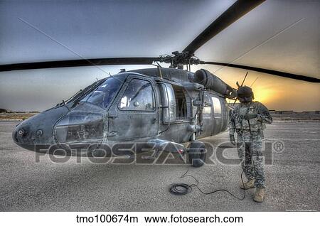 High Dynamic Range Image Of A Door Gunner Beside A Uh 60 Black