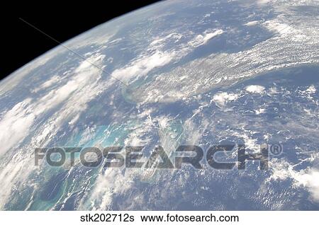 High oblique Earth view of the Florida peninsula and its neighboring geographic features. View Large Photo Image Stock Photograph - High oblique Earth view of the Florida peninsula and its neighboring geographic features.. Fotosearch