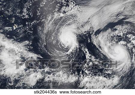 Hurricane Iselle and Hurricane Julio over the Pacific Ocean. View Large Photo Image Stock Photograph - Hurricane Iselle and Hurricane Julio over the Pacific Ocean.. Fotosearch