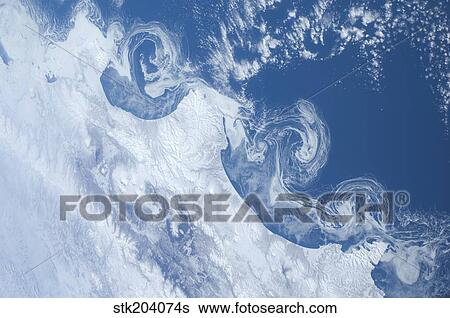 Ice floes along the coastline of Kamchatka. View Large Photo Image Stock Photograph - Ice floes along the coastline of Kamchatka.. Fotosearch