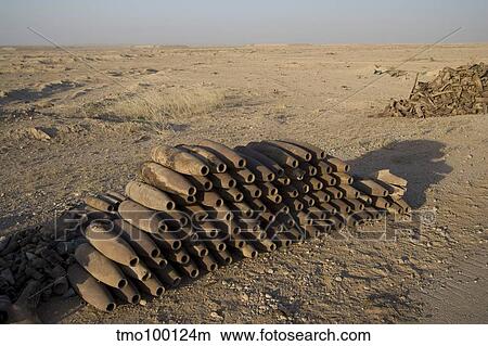 Inert artillery shells are stacked up for collection. View Large Photo Image Picture - Inert artillery shells are stacked up for collection.. Fotosearch