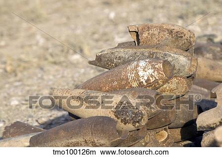 Inert artillery shells are stacked up for collection. View Large Photo Image Picture - Inert artillery shells are stacked up for collection.. Fotosearch
