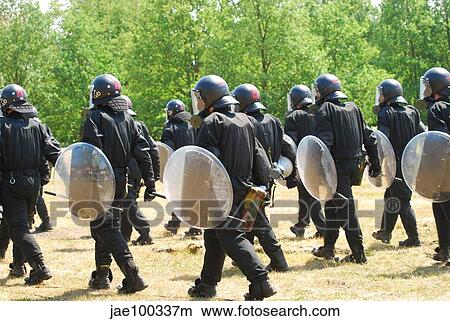 Infantry soldiers of the Belgian Army in full riot gear. View Large Photo Image Picture - Infantry soldiers of the Belgian Army in full riot gear.. Fotosearch