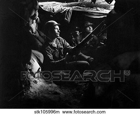 Picture - Infantrymen take advantage of cover and concealment in tunnel positions.. Fotosearch