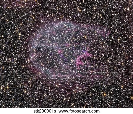 Intricate wisps of glowing gas float amid a myriad of stars. View Large Photo Image Stock Photograph - Intricate wisps of glowing gas float amid a myriad of stars.. Fotosearch
