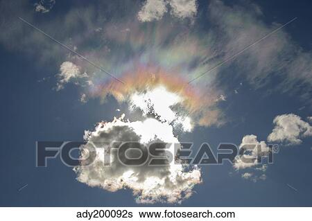 Iridescent clouds, Alberta, Canada. View Large Photo Image Stock Photograph - Iridescent clouds, Alberta, Canada.. Fotosearch