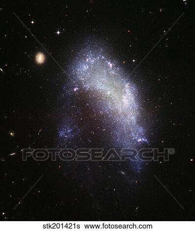 Irregular galaxy NGC 1427A. View Large Photo Image Stock Photograph - Irregular galaxy NGC 1427A.. Fotosearch