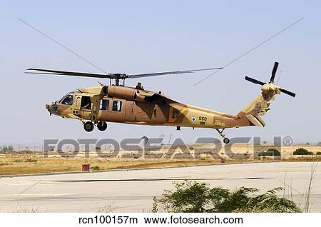 Picture - Israeli Air Force UH-60 Yanshuf helicopter taking off from Hatzerim Airbase, Israel.. Fotosearch