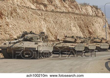 Israeli Defense Force Merkava Mark III-D battle tanks en route to Lebanon. View Large Photo Image Picture - Israeli Defense Force Merkava Mark III-D battle tanks en route to Lebanon.. Fotosearch