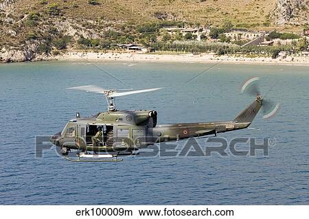Italian Air Force AB-212 ICO helicopter in flight over Italy. View Large Photo Image Picture - Italian Air Force AB-212 ICO helicopter in flight over Italy.. Fotosearch