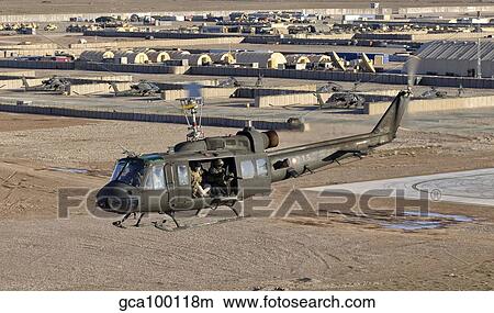 Italian Army AB-205MEP utility helicopter in flight over Shindand, Afghanistan. View Large Photo Image Picture - Italian Army AB-205MEP utility helicopter in flight over Shindand, Afghanistan.. Fotosearch