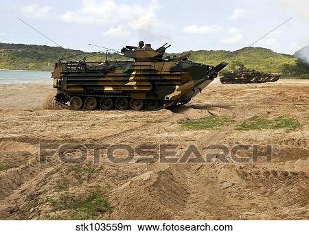Korean amphibious assault vehicles moving across the beach during a simulated amphibious assault in Thailand. View Large Photo Image Picture - Korean amphibious assault vehicles moving across the beach during a simulated amphibious assault in Thailand.. Fotosearch