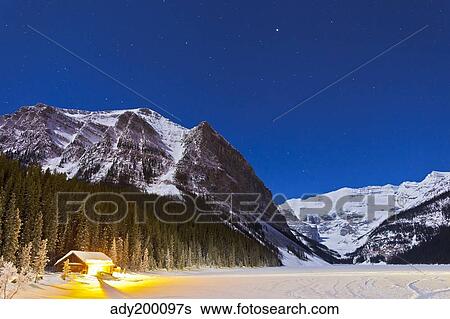 Lake Louise on a clear night in Banff National Park, Alberta, Canada. View Large Photo Image Stock Photograph - Lake Louise on a clear night in Banff National Park, Alberta, Canada.. Fotosearch