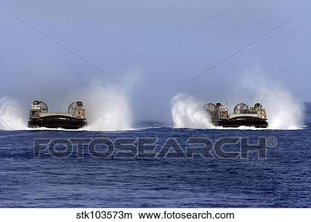 Landing Craft Air Cushion 84 and 87 conduct operations in the U. S. 5th Fleet area of responsibility. View Large Photo Image Picture - Landing Craft Air Cushion 84 and 87 conduct operations in the U. S. 5th Fleet area of responsibility.. Fotosearch