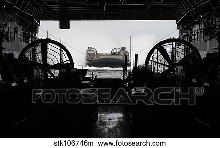 Landing Craft Air Cushion approaches the well deck of USS San Antonio. View Large Photo Image Picture - Landing Craft Air Cushion approaches the well deck of USS San Antonio.. Fotosearch