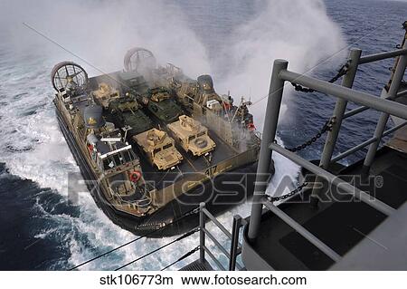 Landing Craft Air Cushion approaches the well deck of USS Bonhomme Richard. View Large Photo Image Picture - Landing Craft Air Cushion approaches the well deck of USS Bonhomme Richard.. Fotosearch