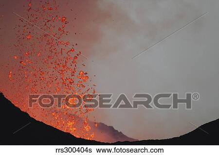 Stock Photograph - Lava bombs expelled during a basaltic fissure eruption on Nyamuragira Volcano.. Fotosearch
