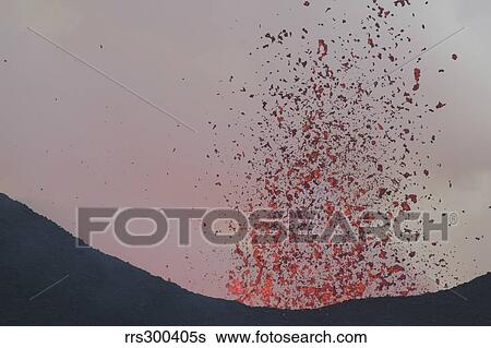 Stock Photograph - Lava bombs expelled during a basaltic fissure eruption on Nyamuragira Volcano.. Fotosearch