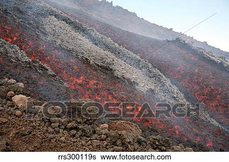 Lava flow during eruption of Mount Etna volcano, Sicily, Italy. View Large Photo Image Stock Photograph - Lava flow during eruption of Mount Etna volcano, Sicily, Italy.. Fotosearch