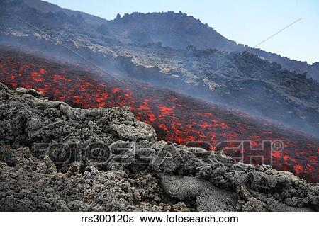 Lava flow during eruption of Mount Etna volcano, Sicily, Italy. View Large Photo Image Stock Photograph - Lava flow during eruption of Mount Etna volcano, Sicily, Italy.. Fotosearch